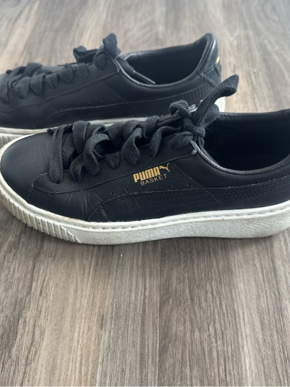 Puma Black Leather Basket Sneakers with White Sole and Gold Logo